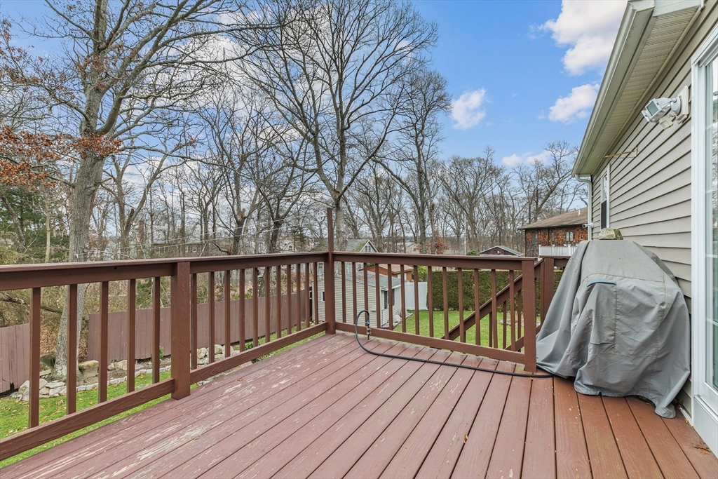 780 Dickinson Street Fall River, MA 02721 - Photo 18 of 42 a view of balcony with wooden floor and fence
