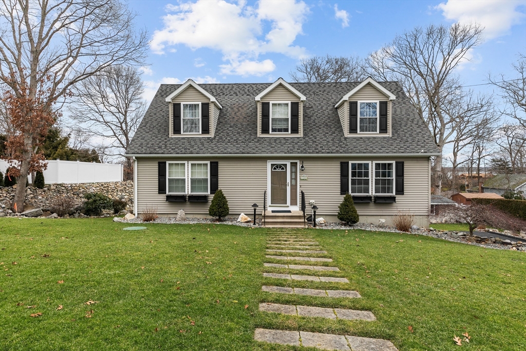 780 Dickinson Street Fall River, MA 02721 - Photo 2 of 42 a front view of a house with a yard
