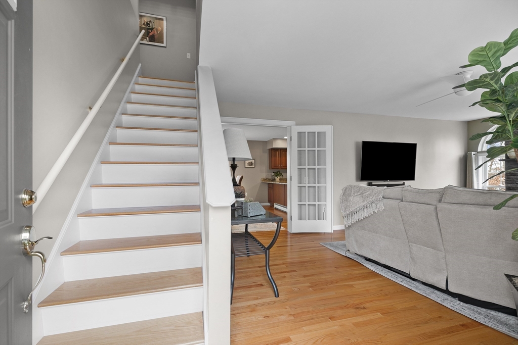 780 Dickinson Street Fall River, MA 02721 - Photo 25 of 42 a living room with furniture and a flat screen tv