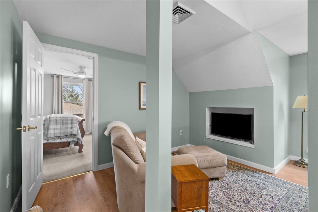 780 Dickinson Street Fall River, MA 02721 - Photo 28 of 42 a living room with furniture and a flat screen tv
