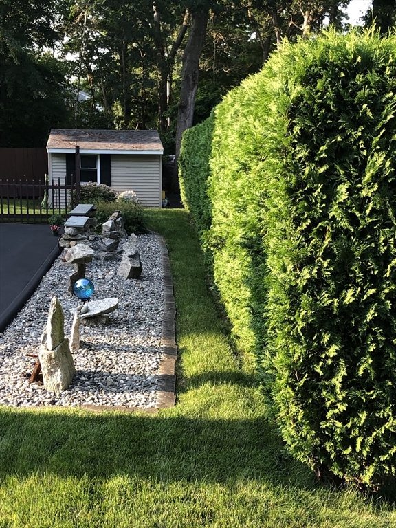 780 Dickinson Street Fall River, MA 02721 - Photo 37 of 42 a front view of a house with a yard