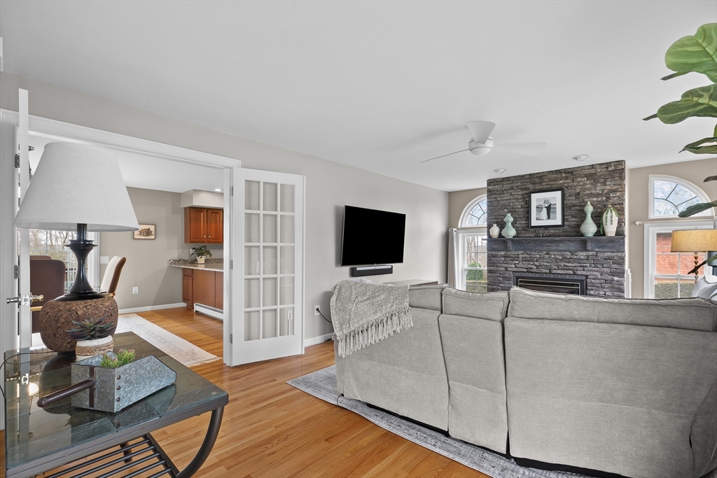 780 Dickinson Street Fall River, MA 02721 - Photo 8 of 42 a living room with furniture and a flat screen tv