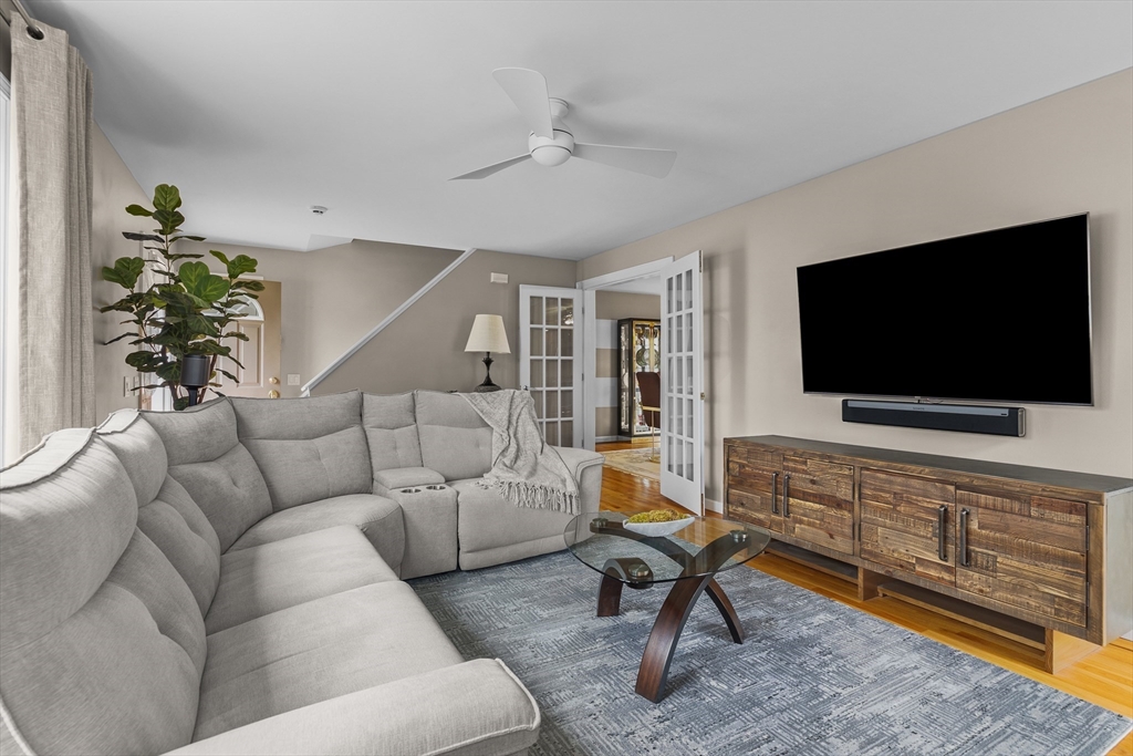 780 Dickinson Street Fall River, MA 02721 - Photo 10 of 42 a living room with furniture and a flat screen tv