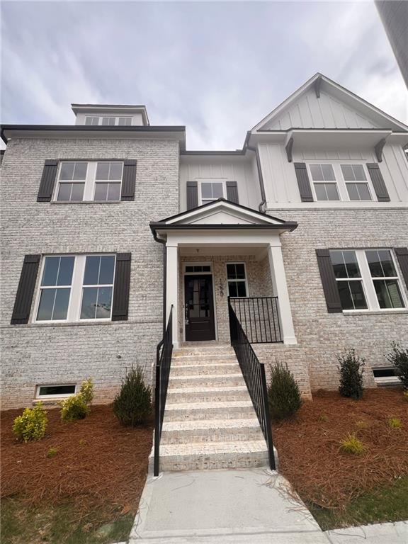 1220 Waterfall Court Cumming, GA 30041 - Photo 11 of 29 a front view of a house