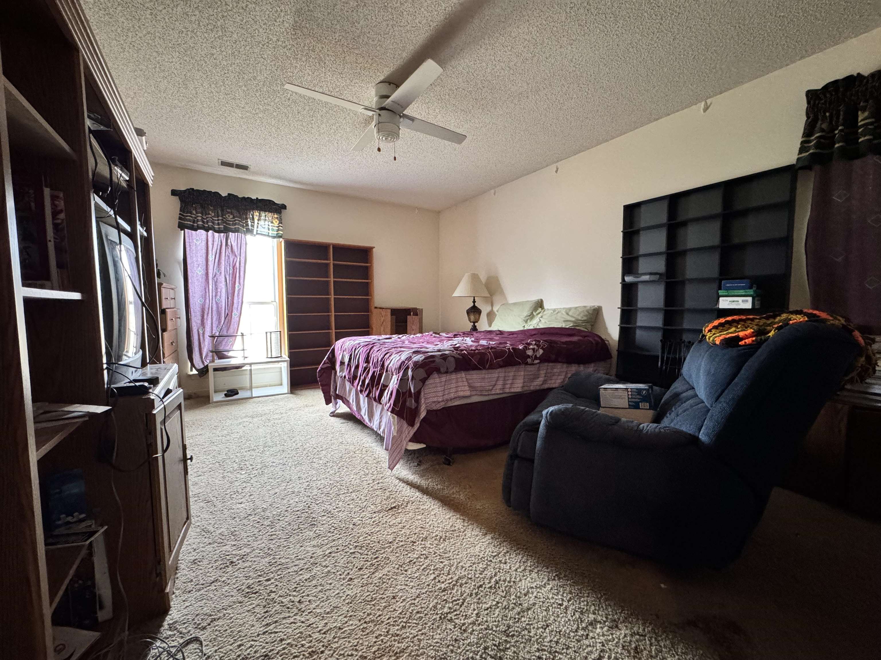 4574 Ross Road Memphis, TN 38141 - Photo 9 of 15 a bedroom with furniture and a window