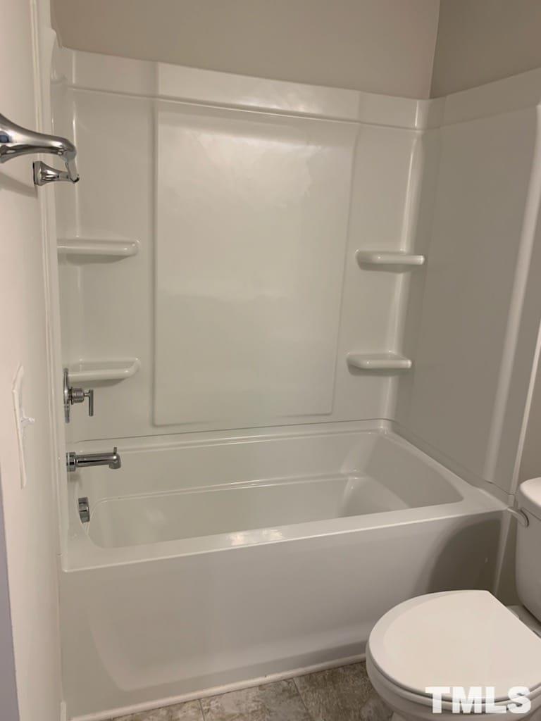 3413 Dropseed Drive Apex, NC 27502 - Photo 18 of 23 a white bath tub sitting next to a white toilet