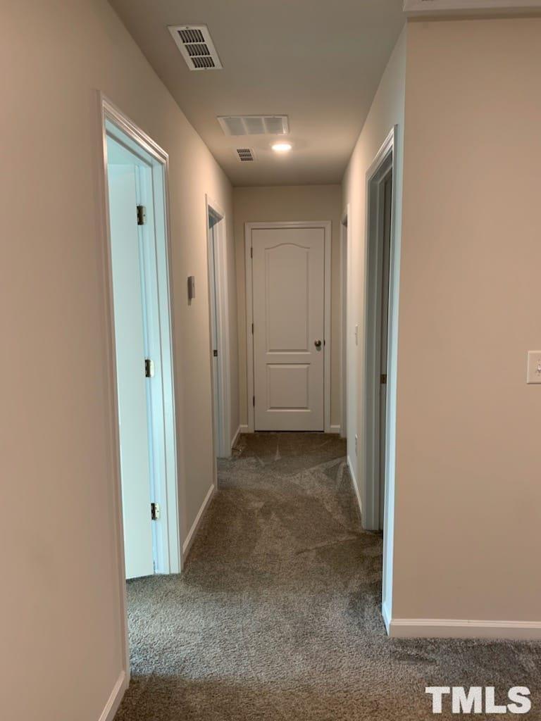 3413 Dropseed Drive Apex, NC 27502 - Photo 20 of 23 a view of a hallway