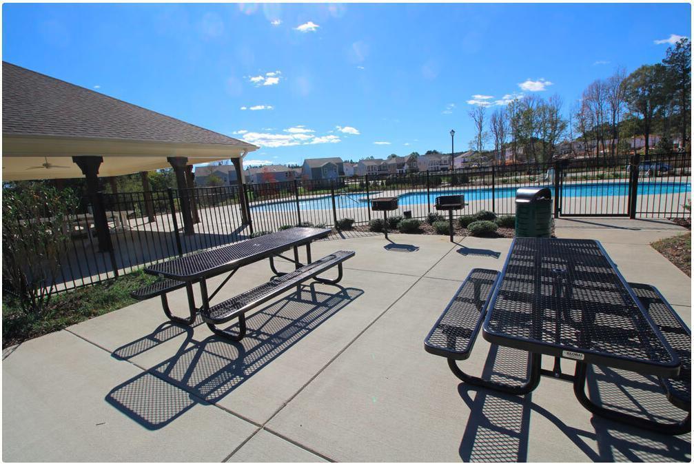 3413 Dropseed Drive Apex, NC 27502 - Photo 23 of 23 a view of a patio with chairs and table