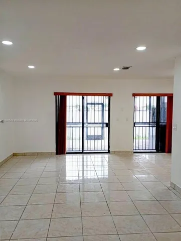 a bathroom with a shower and toilet