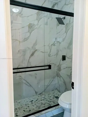 a bathroom with a sink a mirror and a vanity