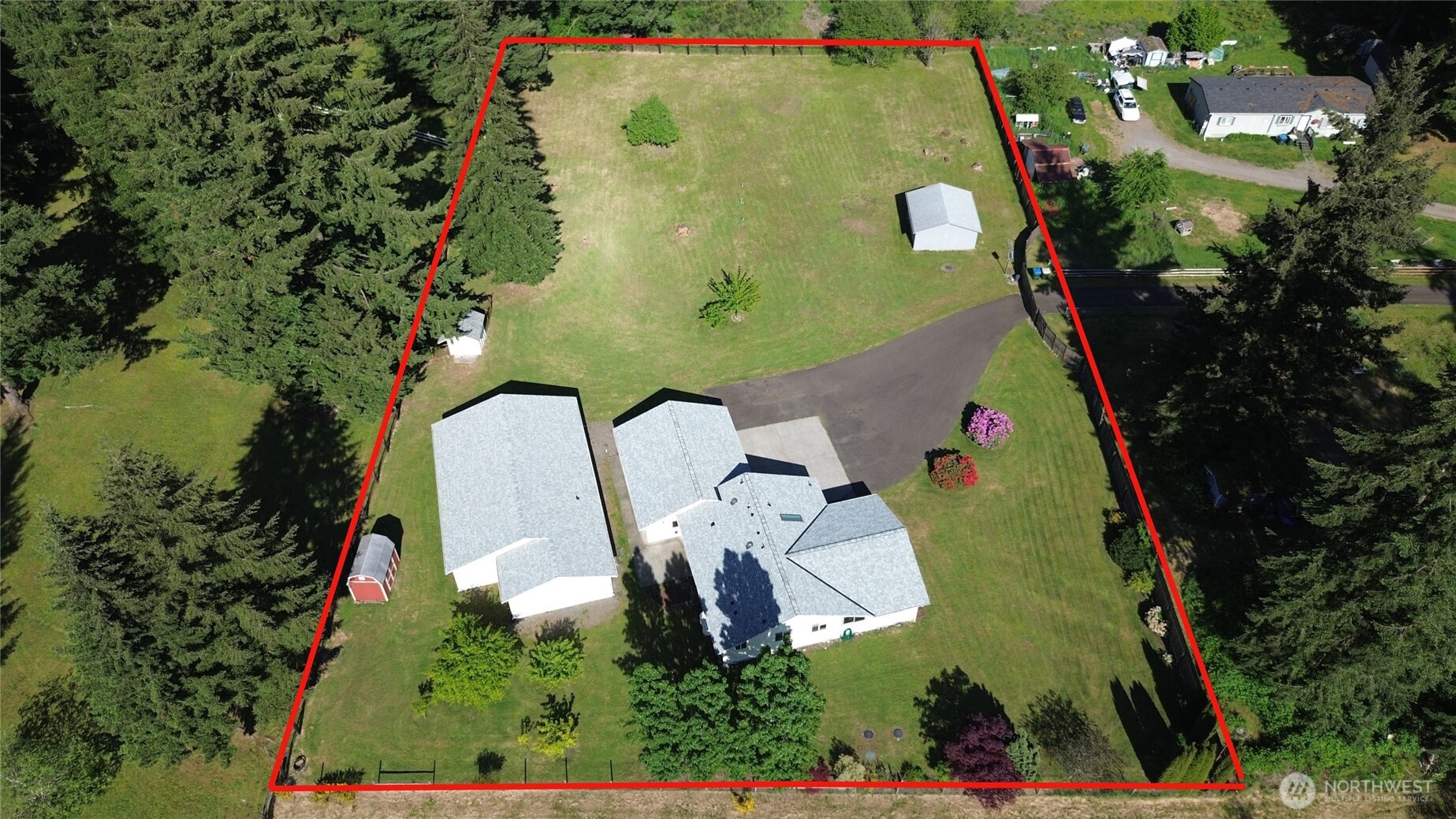 17103 Camas Run Lane Southwest Rochester, WA 98579 - Photo 6 of 40 an aerial view of a residential houses with outdoor space and trees all around