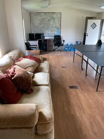 a living room with furniture and a couch