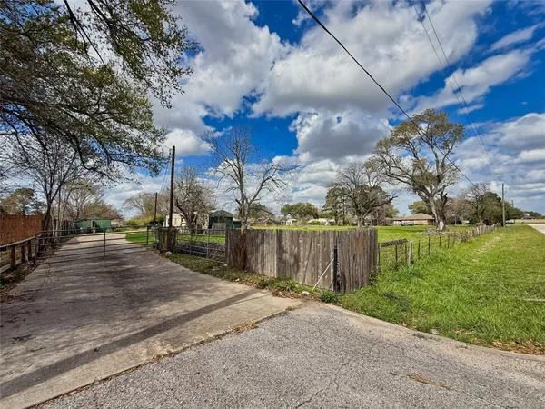 a view of a park next to a yard