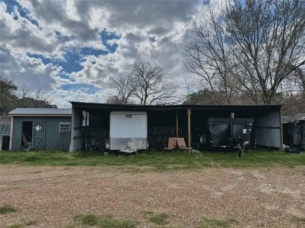 25118 Roesner Lane Katy, TX 77494 - Photo 8 of 14 a view of a house with a yard and garage
