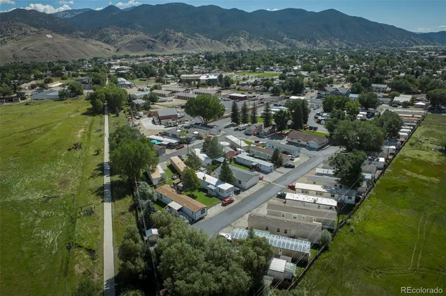 a view of a car park in front of house