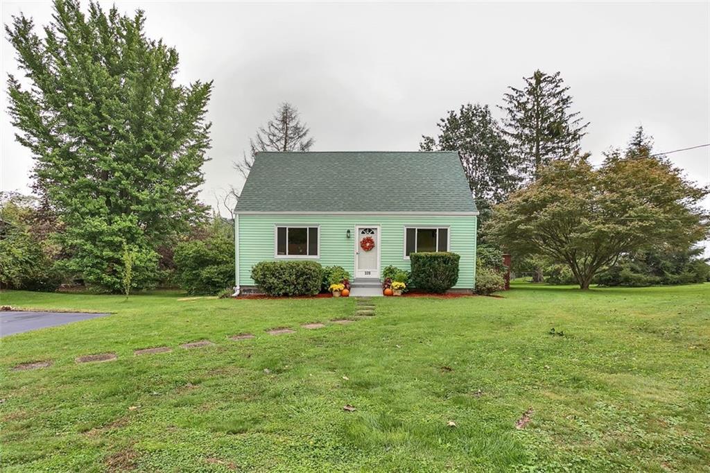 320 Center New Texas Road Pittsburgh, PA 15239 - Photo 1 of 25 a view of a house with a yard and trees