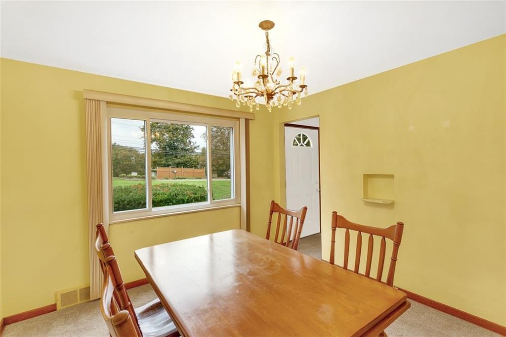 320 Center New Texas Road Pittsburgh, PA 15239 - Photo 8 of 25 a view of a dining room with furniture and a window