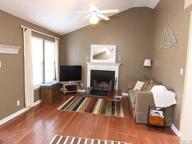 1513 Ed Cook Road Durham, NC 27703 - Photo 2 of 7 Family Room with Hardwood Floors and Fireplace