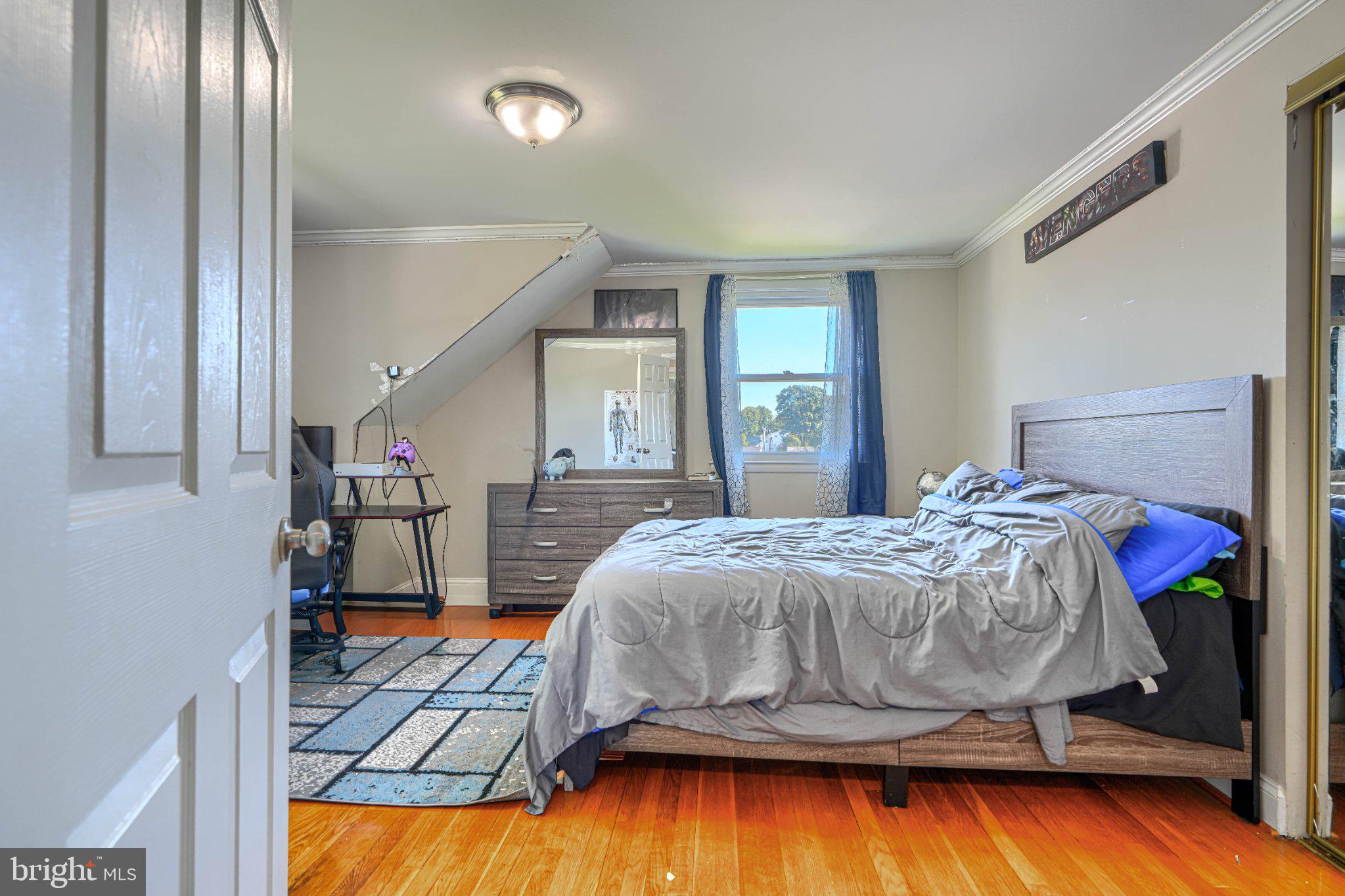 3708 Cassen Road Randallstown, MD 21133 - Photo 27 of 38 a bedroom with a bed and a view of bathroom