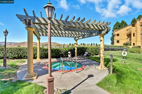 a view of yard with swimming pool