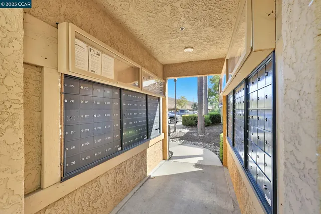 a view of a swimming pool with an outdoor seating