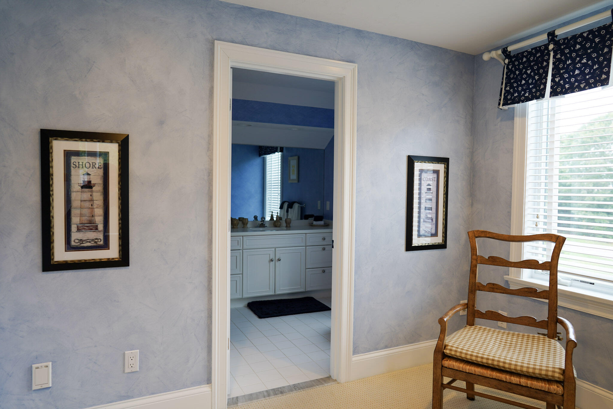 14 Shoestring Bay Road Mashpee, MA 02649 - Photo 54 of 66 a view of a hallway with furniture and windows