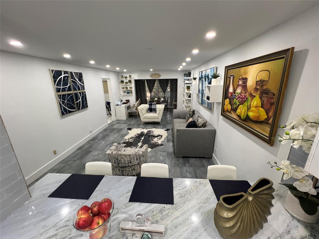 400 Northeast 20th Street, Unit C115 Boca Raton, FL 33431 - Photo 14 of 33 a living room with furniture and a rug