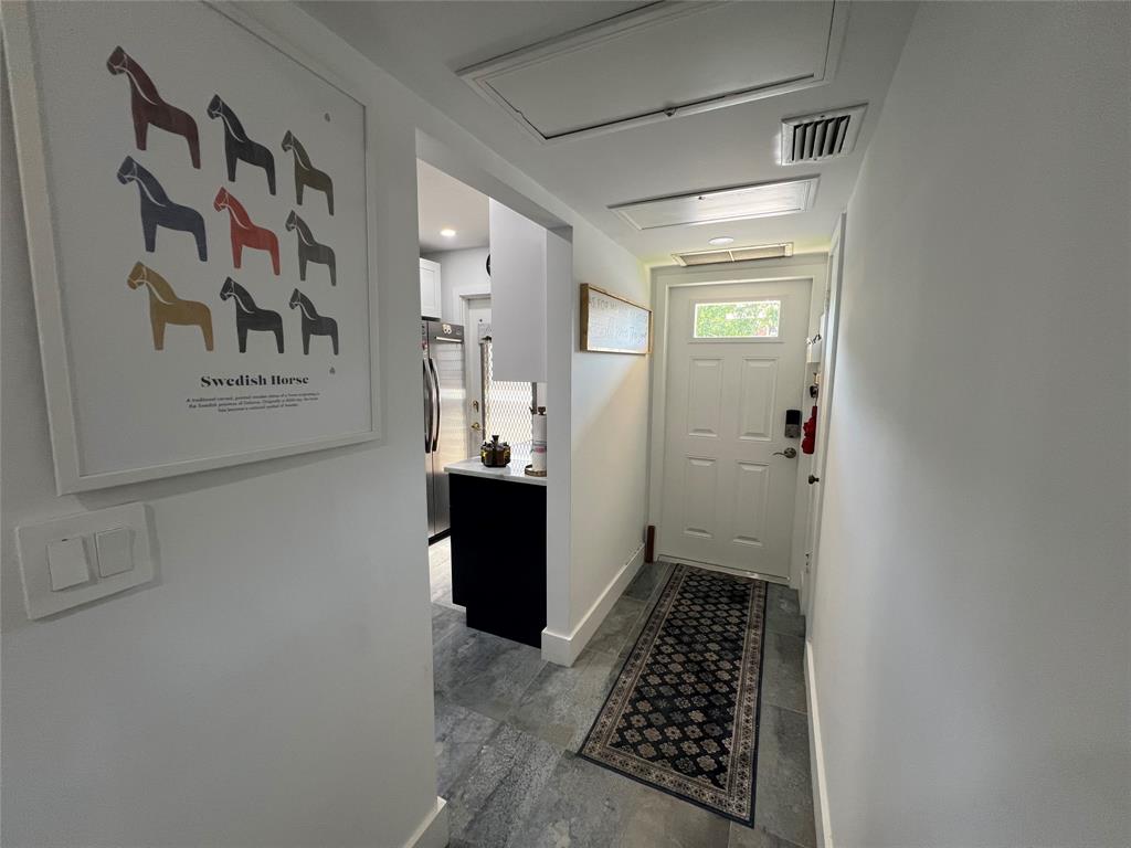 400 Northeast 20th Street, Unit C115 Boca Raton, FL 33431 - Photo 16 of 33 a walk in closet with wooden floor