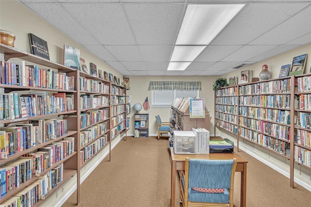 400 Northeast 20th Street, Unit C115 Boca Raton, FL 33431 - Photo 28 of 33 a reading room with furniture book shelf and a book shelf