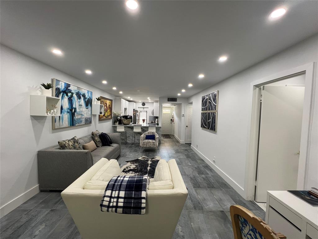 400 Northeast 20th Street, Unit C115 Boca Raton, FL 33431 - Photo 10 of 33 a living room with furniture and a large window