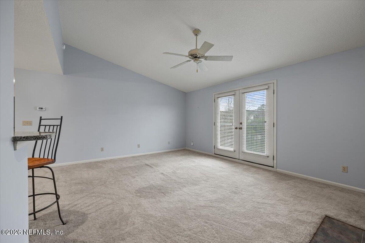 106 Ponte Vedra Colony Circle Ponte Vedra Beach, FL 32082 - Photo 11 of 30 a view of an empty room with a window