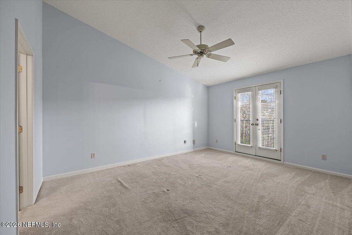 106 Ponte Vedra Colony Circle Ponte Vedra Beach, FL 32082 - Photo 20 of 30 a view of an empty room with a window