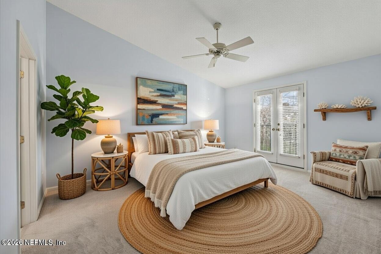 106 Ponte Vedra Colony Circle Ponte Vedra Beach, FL 32082 - Photo 21 of 30 a bedroom with a bed and a couch