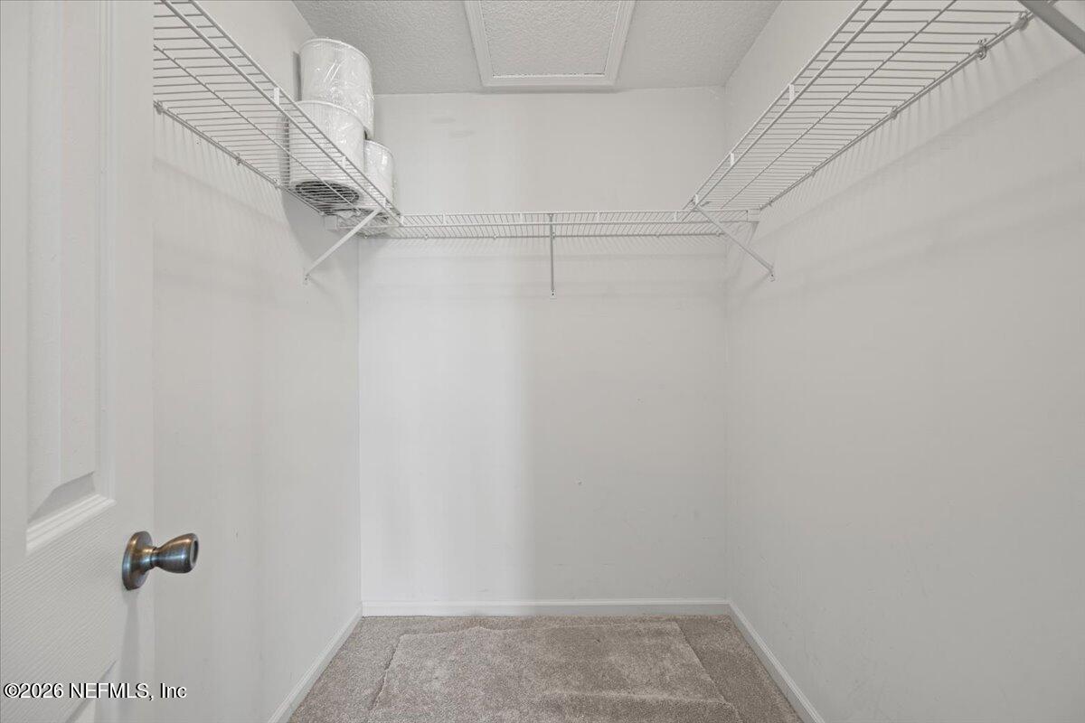 106 Ponte Vedra Colony Circle Ponte Vedra Beach, FL 32082 - Photo 22 of 30 a view of small space with racks on the wall