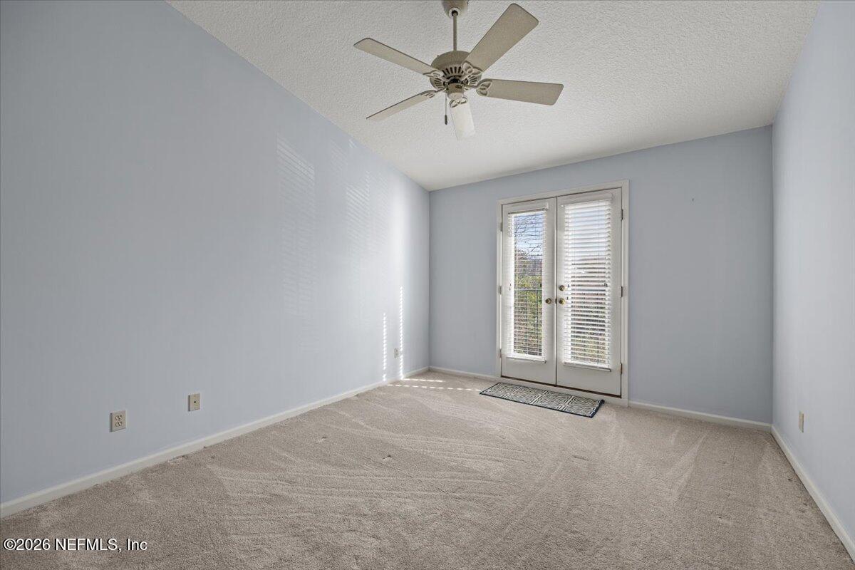 106 Ponte Vedra Colony Circle Ponte Vedra Beach, FL 32082 - Photo 25 of 30 a view of an empty room with a window