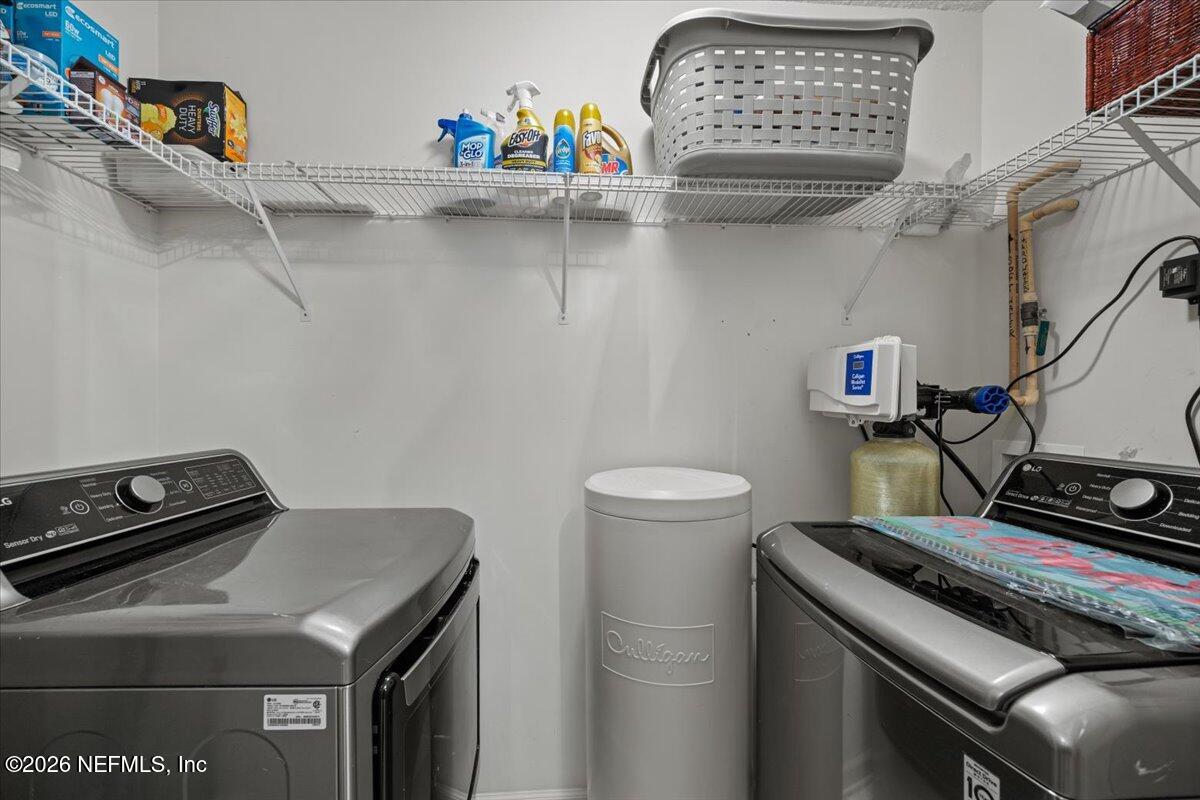 106 Ponte Vedra Colony Circle Ponte Vedra Beach, FL 32082 - Photo 29 of 30 a utility room with dryer and washer