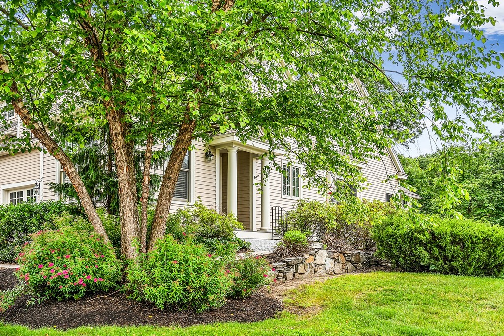 37 Sunset Ridge Lane, Unit 37 Bolton, MA 01740 - Photo 1 of 21 front view of a house with a yard