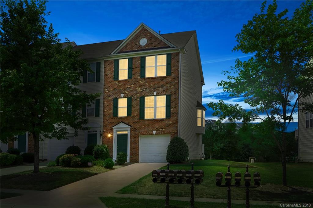 10225 Garrett Grigg Road Charlotte, NC 28262 - Photo 3 of 30 a front view of a house with a yard