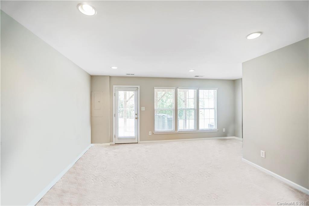 10225 Garrett Grigg Road Charlotte, NC 28262 - Photo 21 of 30 a view of an empty room with a window