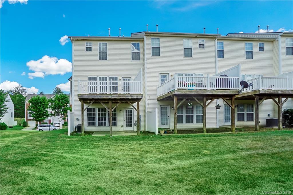 10225 Garrett Grigg Road Charlotte, NC 28262 - Photo 27 of 30 a view of a building with a garden