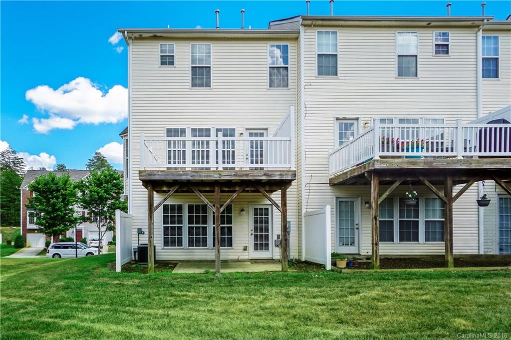 10225 Garrett Grigg Road Charlotte, NC 28262 - Photo 28 of 30 a view of an apartment with a large window and plants