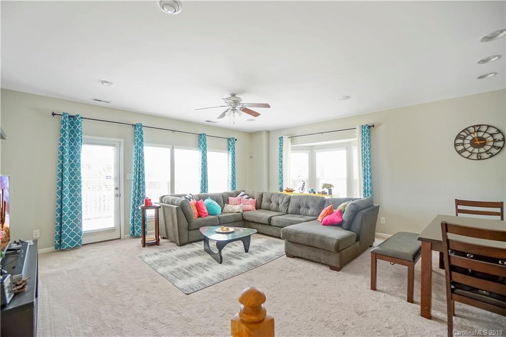 10225 Garrett Grigg Road Charlotte, NC 28262 - Photo 4 of 30 a living room with furniture and a large window