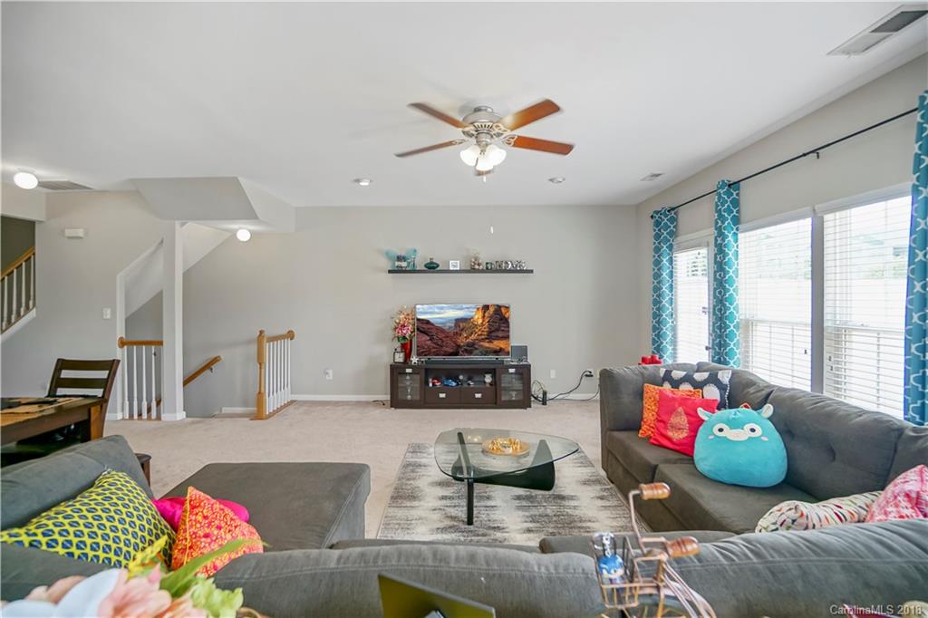 10225 Garrett Grigg Road Charlotte, NC 28262 - Photo 7 of 30 a living room with furniture and a large window