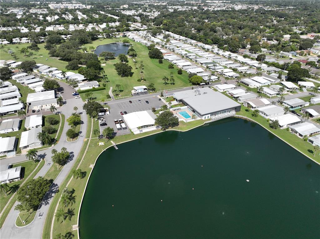 1100 South Belcher Road, Unit 190 Largo, FL 33771 - Photo 20 of 48 an aerial view of a house with a yard