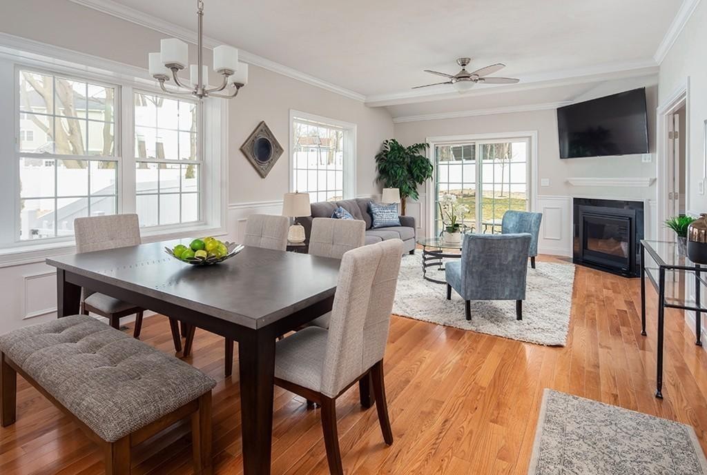 135 Sumner Street, Unit 1 Quincy, MA 02169 - Photo 3 of 13 a view of a dining room with furniture window and wooden floor
