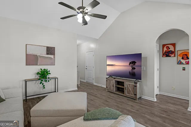 a bedroom with bed and a window