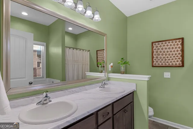 a white bath tub with a window