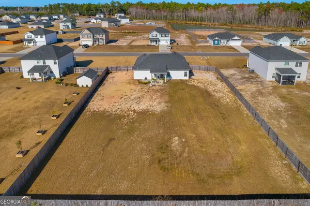 a kitchen with cabinets and white appliances