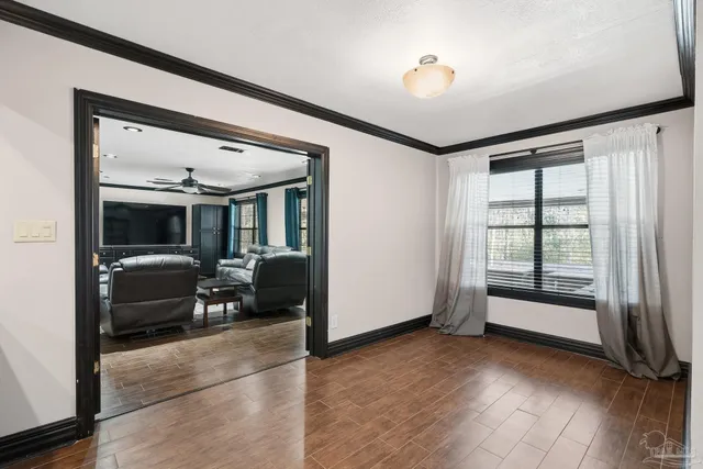 an entryway at livingroom with furniture and windows