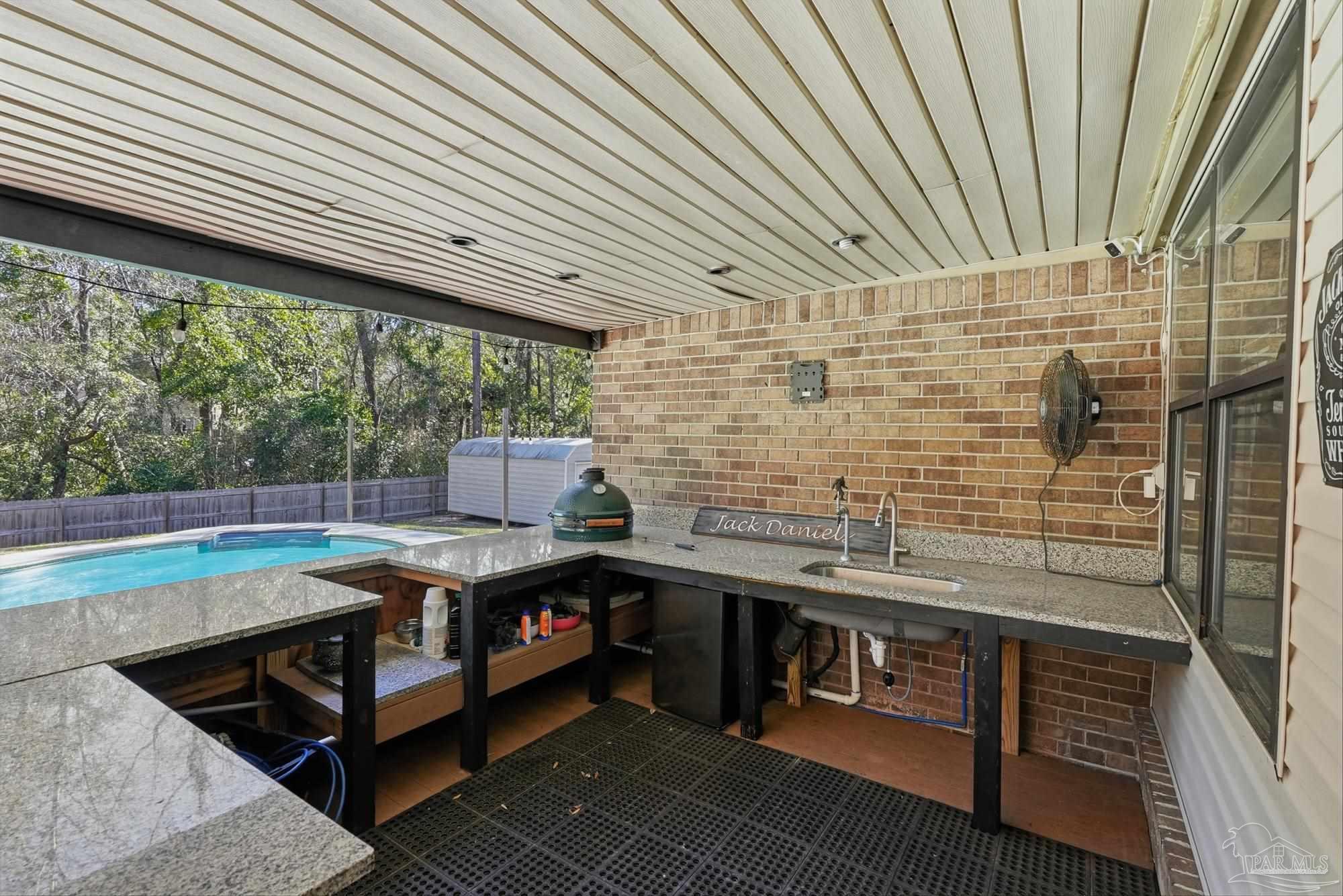 10145 Huntsman Path Pensacola, FL 32514 - Photo 38 of 47 a bath room with stainless steel appliances granite countertop sink and stove